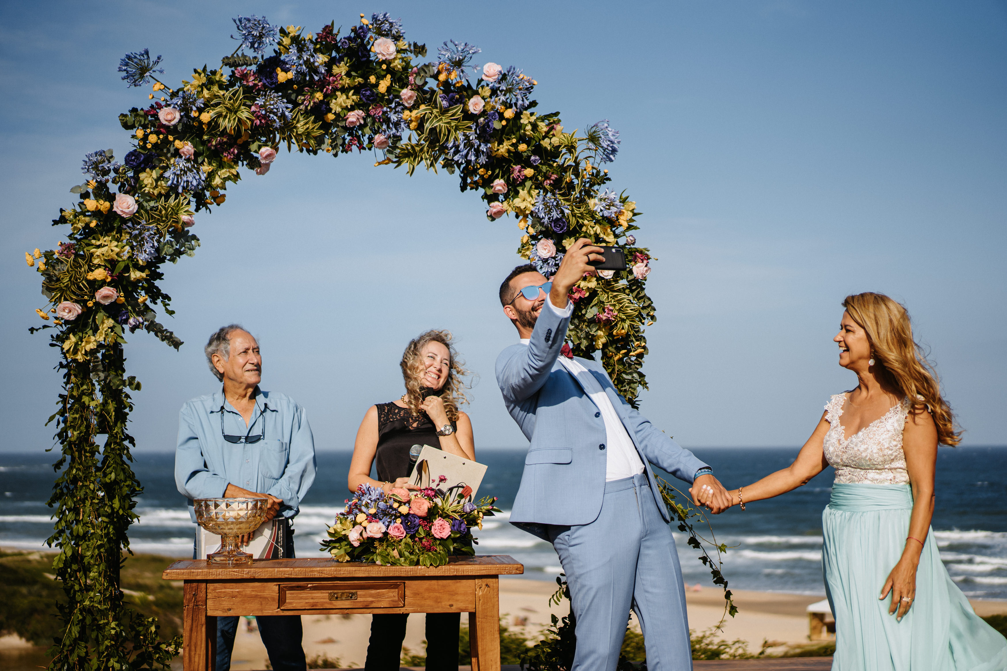 óculos de sol casamento na praia